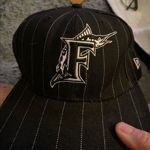 New Florida Marlins new era hat 
7 1/8 
Never worn